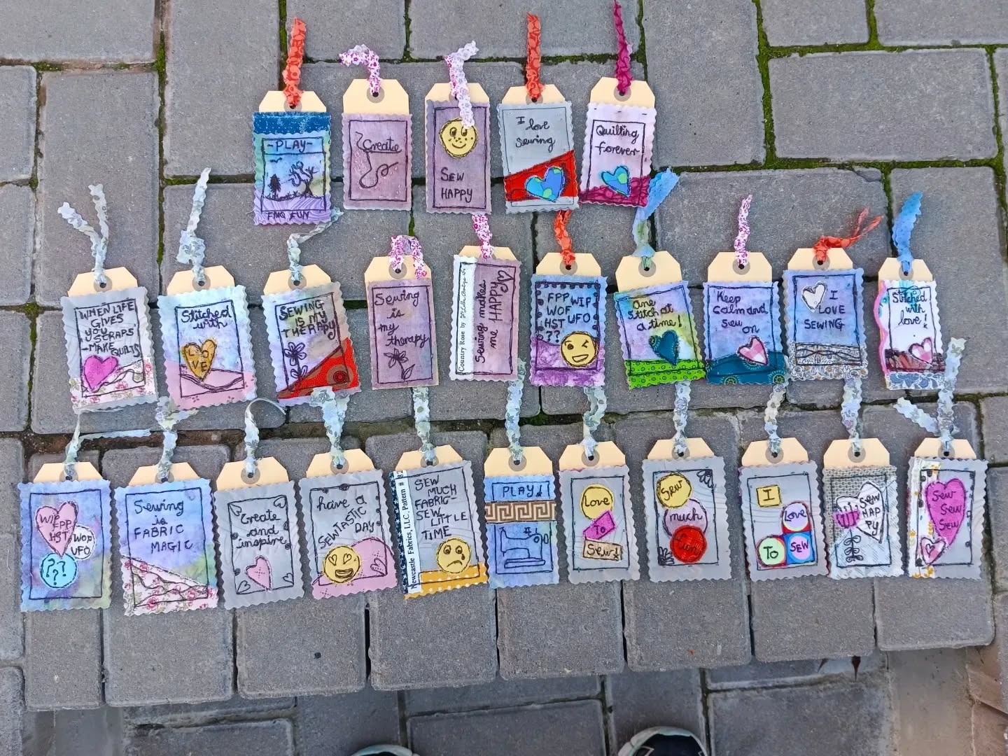 Free-motion stitched fabric tags made from scraps
